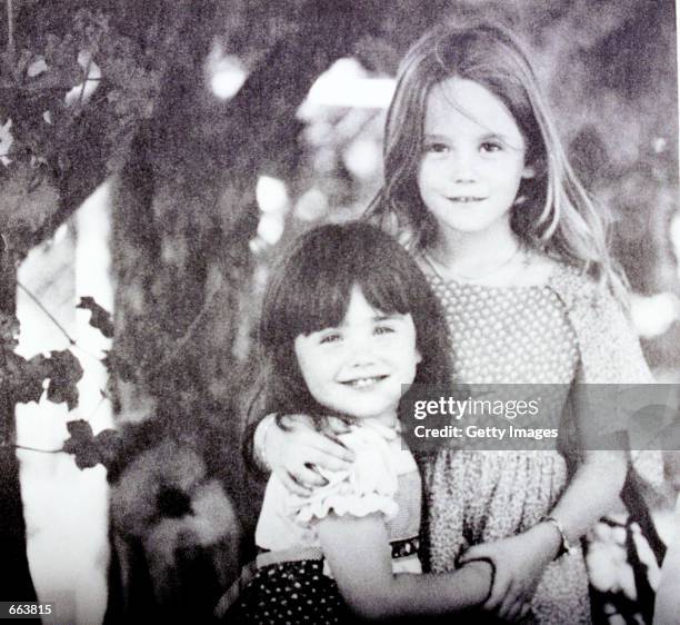 Lana Wood poses with her sister, the late actress Natalie Wood, right, when they were children.