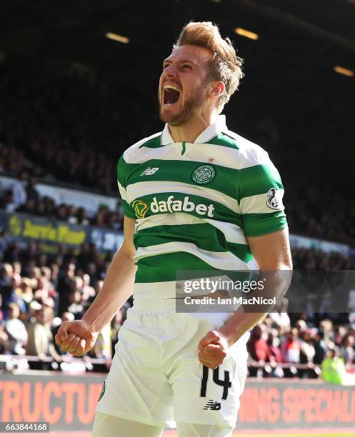 Stuart Armstrong of Celtic celebrates after he scores his team's third goal during the Ladbrokes Premiership match between Hearts and Celtic at...