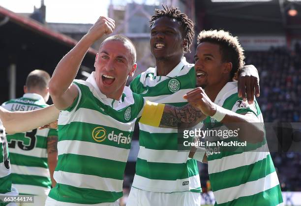 Scott Brown of Celtic celebrates after Stuart Armstrong of Celtic scores his team's third goal during the Ladbrokes Premiership match between Hearts...