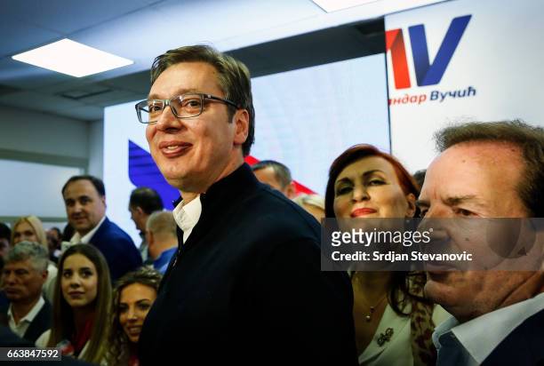 Serbian President-elect Aleksandar Vucic celebrates with Bogoljub Karic after declaring a victory on April 2, 2017 in Belgrade, Serbia. According to...
