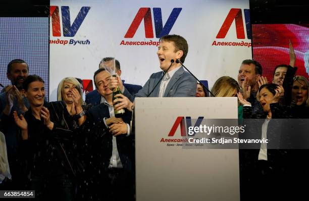 Supporters of Serbian Prime Minister and presidential candidate Aleksandar Vucic celebrate his win in presidential election at his headquarters on...