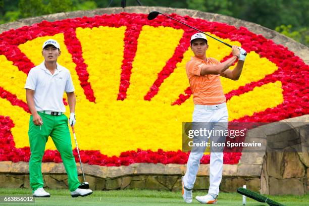 Golfer Sung Kang and Rickie Fowler looks on after the shot from the 18th tee during Shell Houston Open on April 02, 2017 at Golf Club of Houston in...