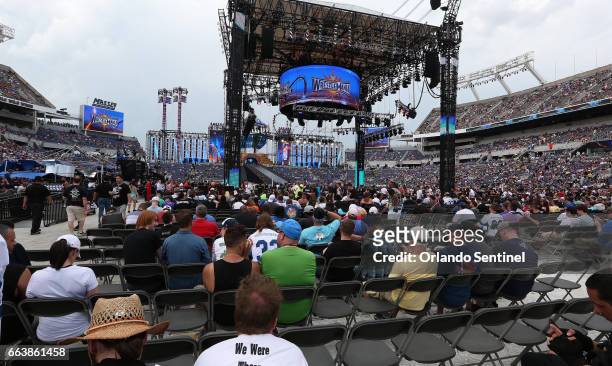 The seats fill up before the start of WrestleMania 33 on Sunday, April 2, 2017 at Camping World Stadium in Orlando, Fla.