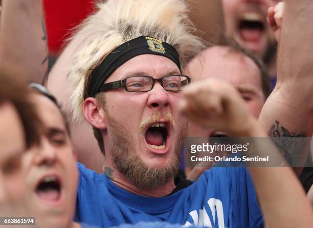 Fans scream during WrestleMania 33 on Sunday, April 2, 2017 at Camping World Stadium in Orlando, Fla.