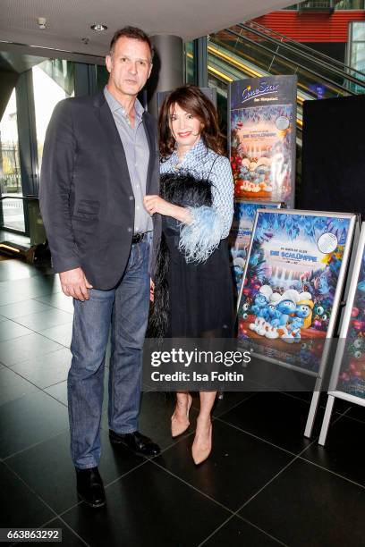 German actress Iris Berben and her partner Heiko Kiesow during the 'Die Schluempfe - Das verlorene Dorf' premiere at Sony Centre on April 2, 2017 in...