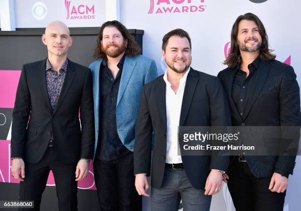 Recording artists Jon Jones, James Young, Mike Eli, and Chris Thompson of music group Eli Young Band attend the 52nd Academy Of Country Music Awards...