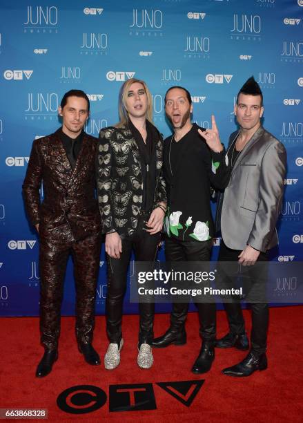 Matt Webb, Josh Ramsay, Ian Casselman and Mike Ayley of Marianas Trench arrive at the 2017 Juno Awards at Canadian Tire Centre on April 2, 2017 in...