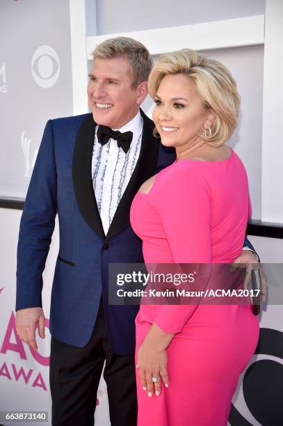 Personalities Todd Chrisley and Julie Chrisley attend the 52nd Academy Of Country Music Awards at Toshiba Plaza on April 2, 2017 in Las Vegas, Nevada.