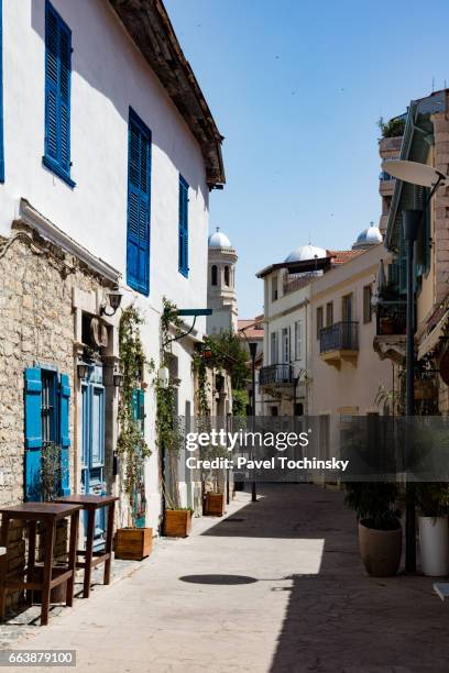 narrow street in the old town of limassol - limassol cyprus stock pictures, royalty-free photos & images