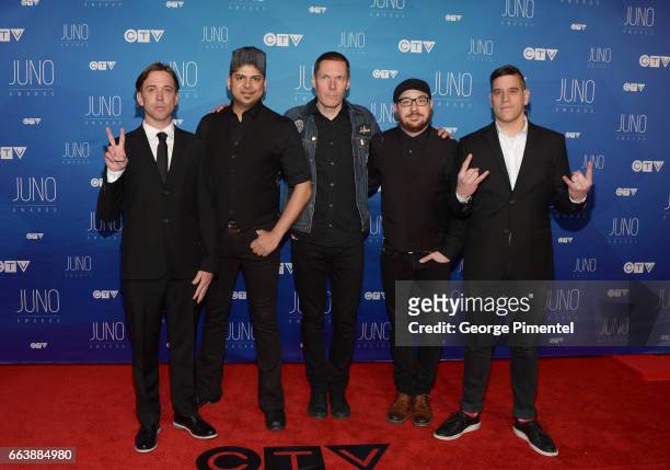 Benjamin Kowalewicz, Ian D'Sa, Aaron Solowoniuk, Jordan Hastings and Jonathan Gallant of Billy Talent arrive at the 2017 Juno Awards at Canadian Tire...