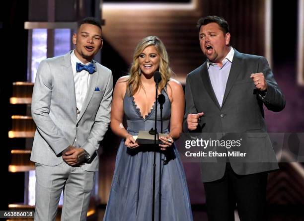 Recording artist Kane Brown, recording artist Lauren Alaina, and radio personallity Storme Warren speak onstage during the 52nd Academy of Country...