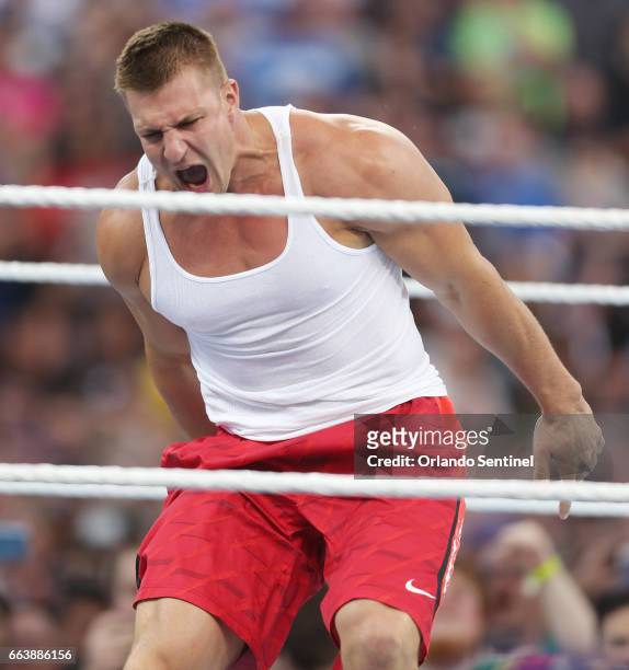 New England Patriots tight end Rob Gronkowski screams in the ring during WrestleMania 33 on Sunday, April 2, 2017 at Camping World Stadium in...