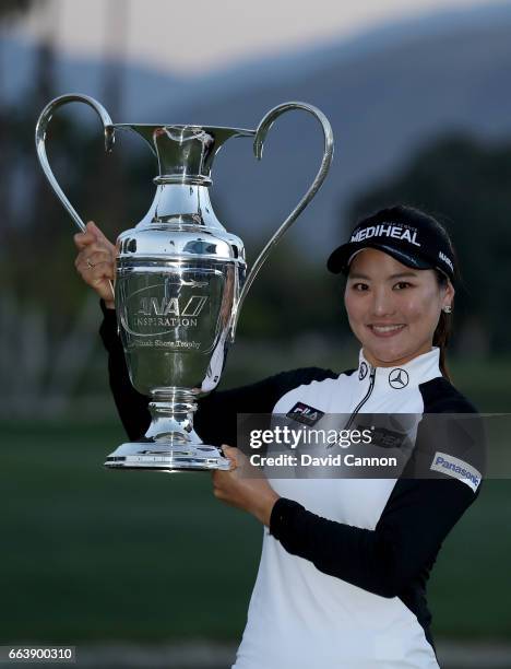 So Yeon Ryu of South Korea holds the trophy aloft after her play-off win during the final round of the 2017 ANA Inspiration held on the Dinah Shore...