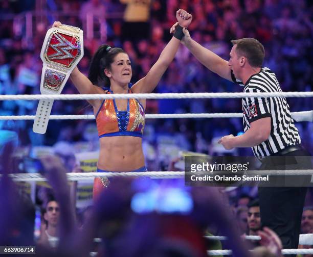 Bayley celebrates her win during WrestleMania 33 on Sunday, April 2, 2017 at Camping World Stadium in Orlando, Fla.