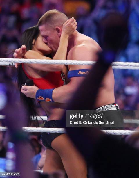 John Cena proposes to Nikki Bella during WrestleMania 33 on Sunday, April 2, 2017 at Camping World Stadium in Orlando, Fla.
