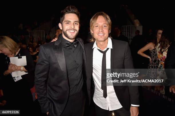 Music artists Thomas Rhett and Keith Urban attend the 52nd Academy Of Country Music Awards at T-Mobile Arena on April 2, 2017 in Las Vegas, Nevada.