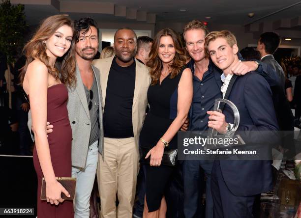 Actor Kaia Gerber, Jahil Fisher, director Lee Daniels, Cindy Crawford, Rande Gerber and honoree Presley Gerber pose with the Emerging Model award...