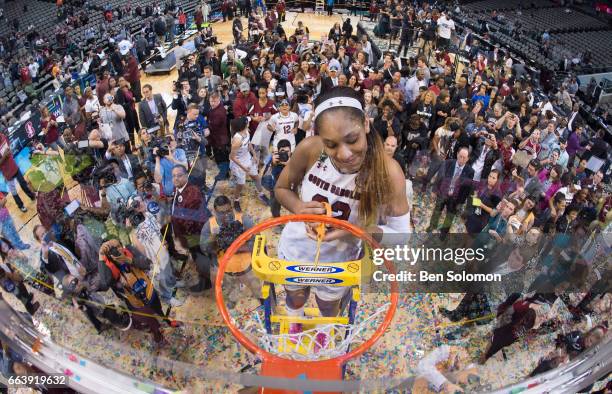 Ja Wilson of the South Carolina Gamecocks cuts the net after beating the Mississippi State Lady Bulldogs during the 2017 Women's Final Four at...