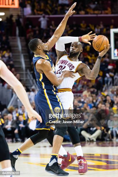 Thaddeus Young of the Indiana Pacers guards LeBron James of the Cleveland Cavaliers during the second half at Quicken Loans Arena on April 2, 2017 in...