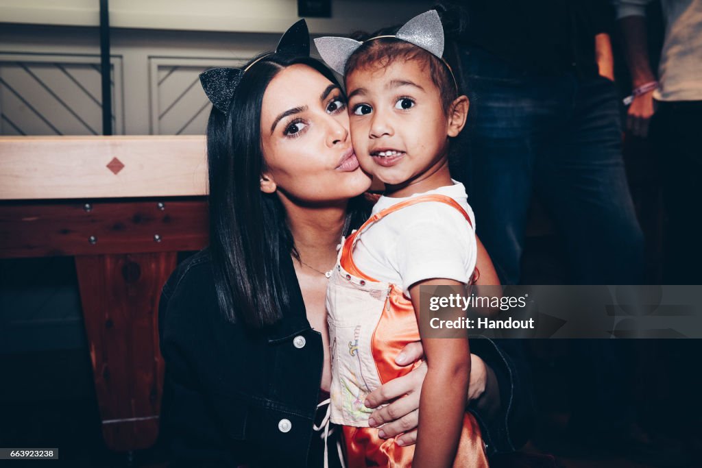 Kim Kardashian And North West Attend Ariana Grande's Dangerous Woman Concert At The Forum