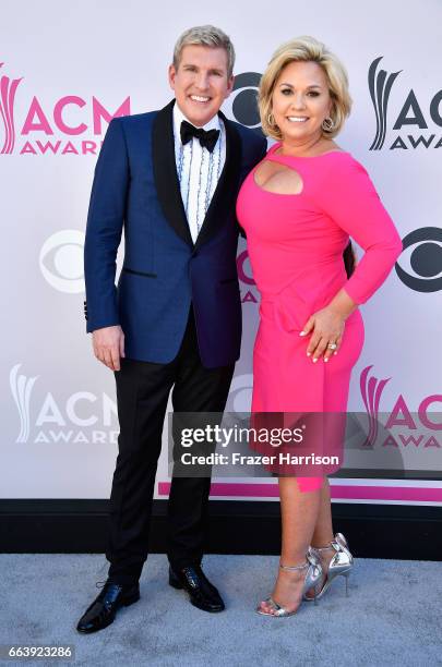 Personalities Todd Chrisley and Julie Chrisley attend the 52nd Academy Of Country Music Awards at Toshiba Plaza on April 2, 2017 in Las Vegas, Nevada.