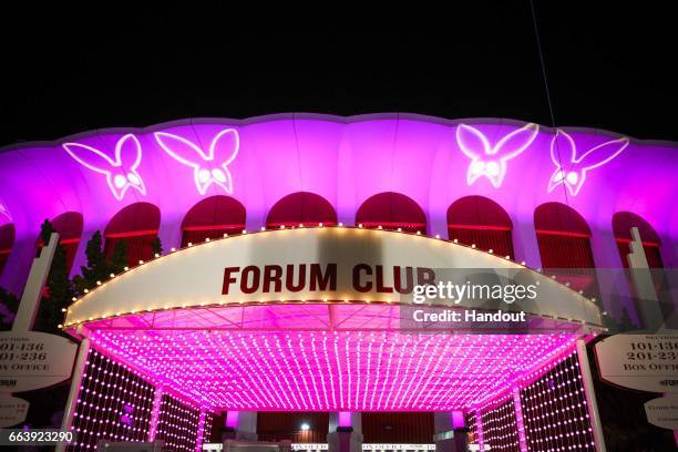 In this handout photo provided by Forum Photos, The Forum celebrated Ariana Grande's Dangerous Woman show at the venue by projecting huge custom...