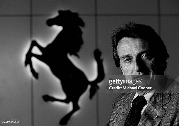 And Chairman of Ferrari, Luca Di Montezemolo poses for a portrait in front of the Prancing Horse logo of Ferrari on 28th April at the Scuderia...