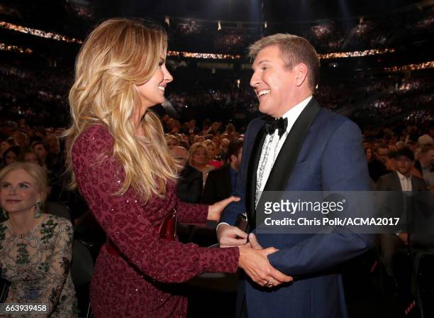 Singer Faith Hill and TV personality Todd Chrisley attend the 52nd Academy Of Country Music Awards at T-Mobile Arena on April 2, 2017 in Las Vegas,...