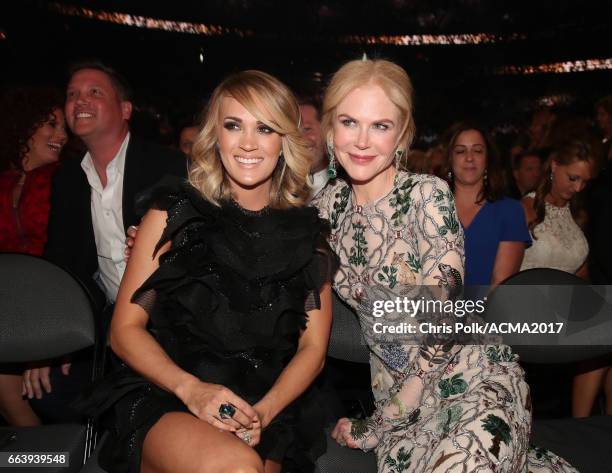 Recording artist Carrie Underwood and actor Nicole Kidman attend the 52nd Academy Of Country Music Awards at T-Mobile Arena on April 2, 2017 in Las...