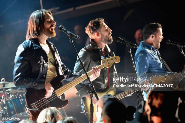Recording artists Geoff Sprung, Matthew Ramsey, and Brad Tursi of music group Old Dominion perform onstage at the 52nd Academy Of Country Music...