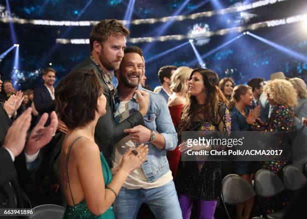 Singer Charles Kelley , of Lady Antebellum, embraces singer Jimi Westbrook, of Little Big Town, during the 52nd Academy Of Country Music Awards at...