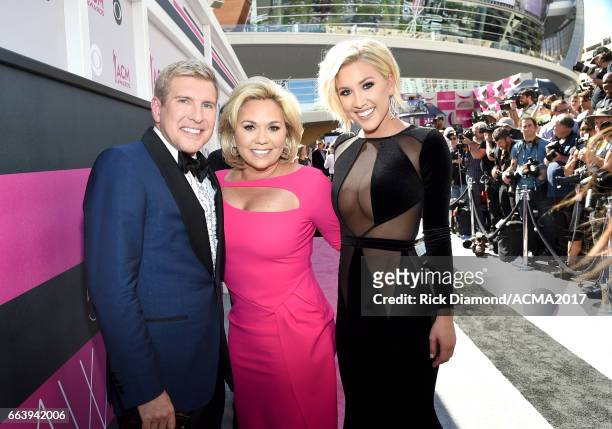 Personalities Todd Chrisley, Julie Chrisley, and Savannah Chrisley attend the 52nd Academy Of Country Music Awards at Toshiba Plaza on April 2, 2017...