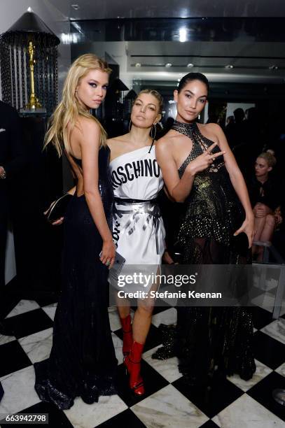 Stella Maxwell, Fergie and Lily Aldridge attend The Daily Front Row and REVOLVE FLA after party at Mr. Chow hosted by Mert Alas on April 2, 2017 in...