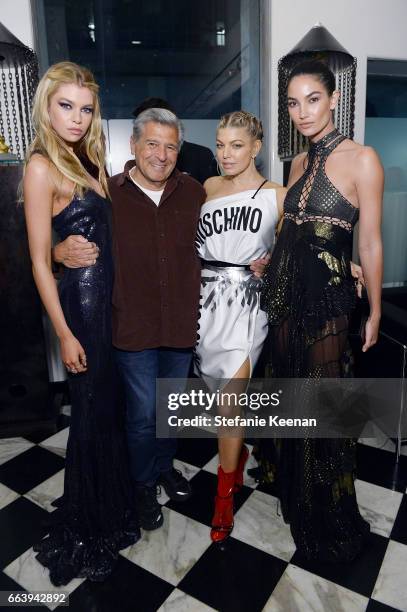 Stella Maxwell, Edward Razek, Fergie and Lily Aldridge attend The Daily Front Row and REVOLVE FLA after party at Mr. Chow hosted by Mert Alas on...