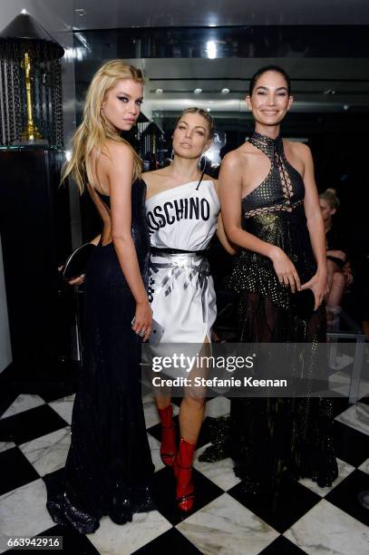Stella Maxwell, Fergie and Lily Aldridge attend The Daily Front Row and REVOLVE FLA after party at Mr. Chow hosted by Mert Alas on April 2, 2017 in...