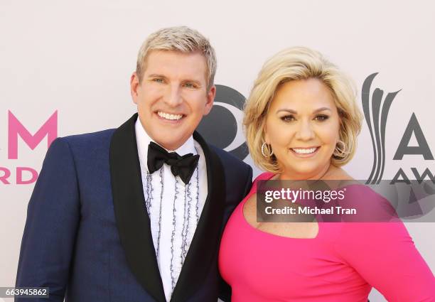 Todd Chrisley and Julie Chrisley arrive at the 52nd Academy of Country Music Awards held at T-Mobile Arena on April 2, 2017 in Las Vegas, Nevada.