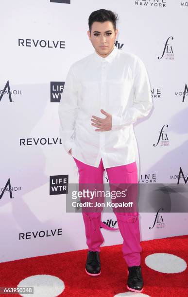 Beauty blogger Manny Mua arrives at the Daily Front Row's 3rd Annual Fashion Los Angeles Awards at the Sunset Tower Hotel on April 2, 2017 in West...