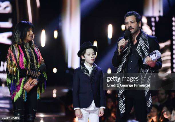 Adam Cohen son of the late Lenoard Cohen and Adam's son Cassius received award for the late Lenoard Cohen, presented by Buffy Sainte-Marie and Jim...