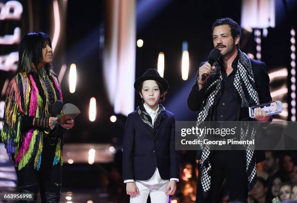 Adam Cohen son of the late Lenoard Cohen and Adam's son Cassius received award for the late Lenoard Cohen, presented by Buffy Sainte-Marie and Jim...