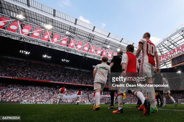 Captain, Davy Klaassen of Ajax walks out to play the Dutch Eredivisie match between Ajax Amsterdam and Feyenoord at Amsterdam ArenA on April 2, 2017...