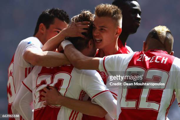 Lasse Schone of Ajax celebrates scoring his teams first goal of the game with team mates Nick Viergever, Daley Sinkgraven, Davinson Sanchez and Hakim...