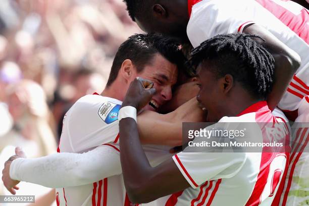 Lasse Schone of Ajax celebrates scoring his teams first goal of the game with team mates Nick Viergever, Bertrand Traore and Davinson Sanchez during...
