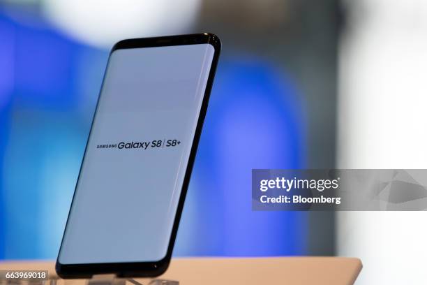 Samsung Electronics Co. Galaxy S8 smartphone is displayed at the company's D'light flagship store in Seoul, South Korea, on Monday, April 3, 2017....