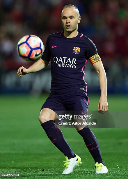 Andres Iniesta of FC Barcelona in action during the La Liga match between Granada CF v FC Barcelona at Estadio Nuevo Los Carmenes on April 02, 2017...