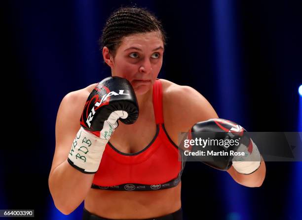 Christina Hammer of Germany in action against Maria Lindberg of Sweden during their WBC middleweight World Championship title fight at Westfalenhalle...