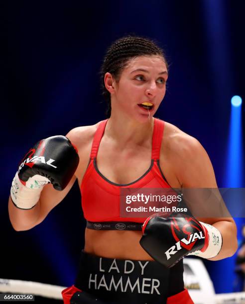 Christina Hammer of Germany in action against Maria Lindberg of Sweden during their WBC middleweight World Championship title fight at Westfalenhalle...