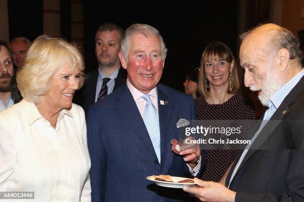 Prince Charles, Prince of Wales and Camilla, Duchess of Cornwall visit Sant'Ambrogio Market to celebrate the Slow Food movement and meet the founder...