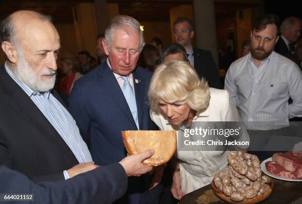 Prince Charles, Prince of Wales and Camilla, Duchess of Cornwall visit Sant'Ambrogio Market to celebrate the Slow Food movement and meet the founder...