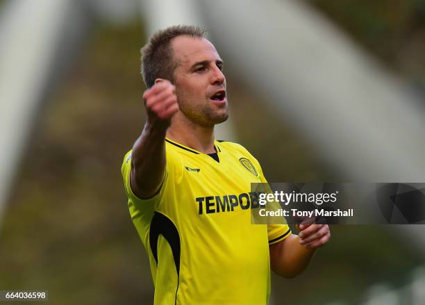 Luke Varney applauds the fans at the end of the match during the Sky Bet Championship match between Huddersfield Town and Burton Albion at the John...