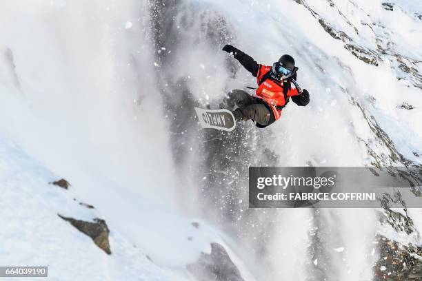 Sweden's Christoffer Granbom competes in the Men's snowboard event during the Verbier Xtreme, Freeride World Tour finals at the Bec des Rosses...